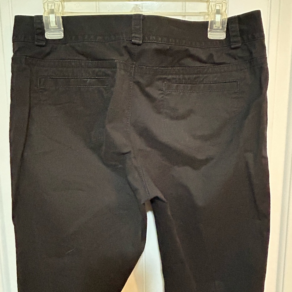 Tops are size Medium or Large. Pants and jeans are sizes 8-12.